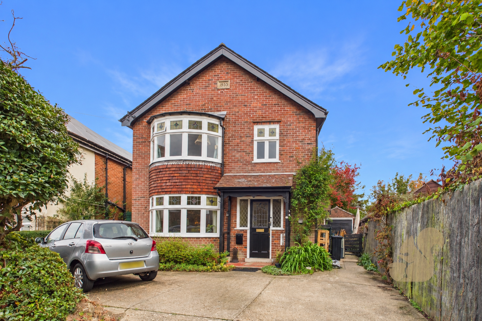 Symmetrical 1933 Brick House Listing