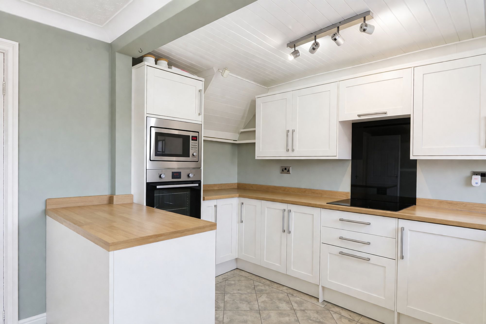 Modern minimalist kitchen with wood accents