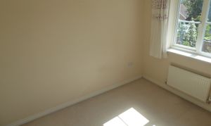 SMALLER BEDROOM