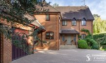 Front of house with drive