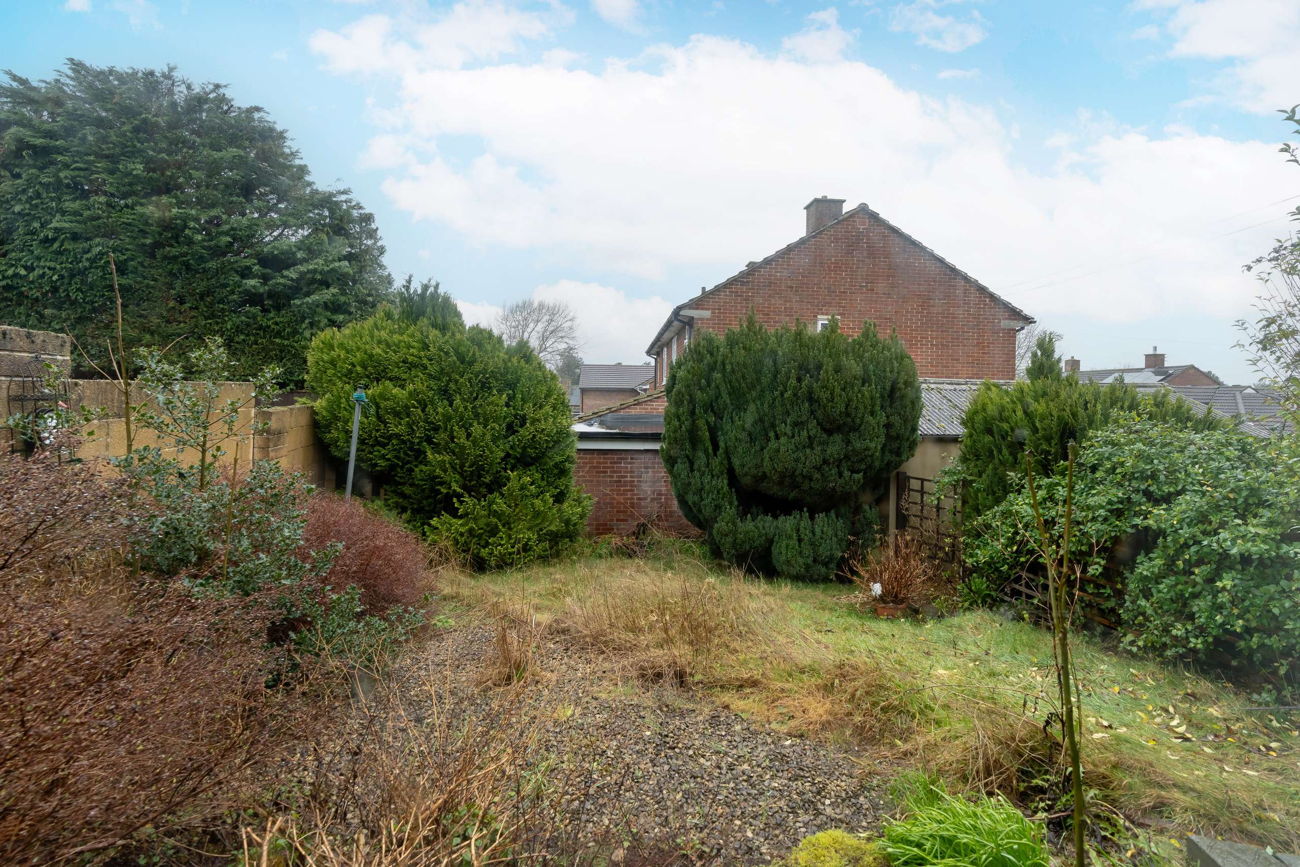 Rear Garden Looking Towards Garage & Driveway